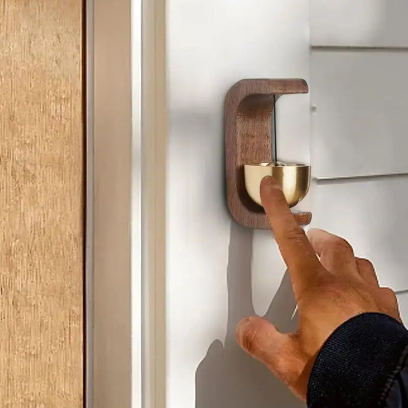 Campanellino per porta in legno è ottone